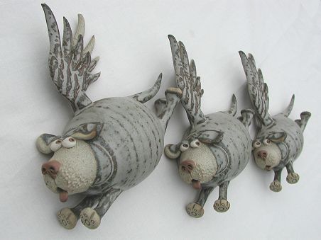  Pottery Flying Dogs - set of three 