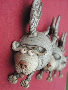  Pottery Flying Dogs - set of three 