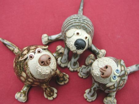  Collectable Miniature Pottery Leggy Dog - seated 