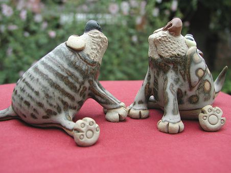  Collectable Miniature Pottery Leggy Dog - seated 