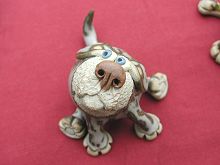  Collectable Miniature Pottery Leggy Dog - seated 