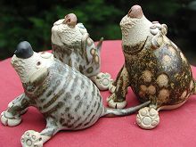  Collectable Miniature Pottery Leggy Dog - seated 