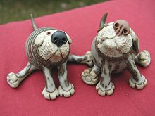  Collectable Miniature Pottery Leggy Dog - seated 