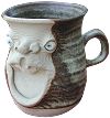  Face Mug - half pint drunk - click to enlarge 